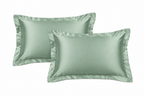 Generated mockup of green satin pillowcases
