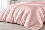Pink satin duvet cover close-up
